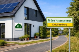 Symbolbild - Haus mit Ortsschild